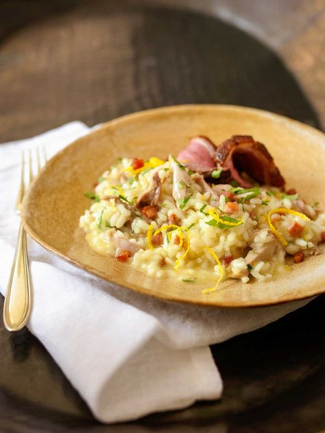 A dreamy, creamy riff on the classic arroz de pato, this dish is made with duck, cured ham, spicy sausage, and tangy oranges. Iberian Recipes, Duck Risotto, Europe Recipes, Creamy Risotto, Portuguese Style, South American Recipes, Side Dishes Recipes, American Dishes, Spicy Sausage