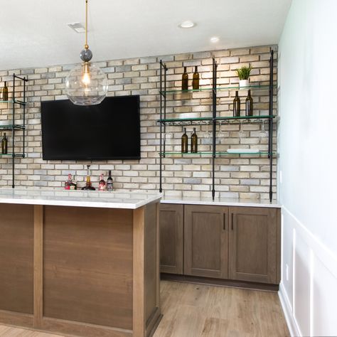 Bar goals achieved! 🍸✨⁠ ⁠ We love how our Bistro Counter to Wall Shelf looks in this beautiful basement bar design. The matte black finish perfectly complements the warm wood tones and ambient lighting.⁠ ⁠ Here's the best part: our shelves are fully customizable! Whether you're working with a cozy nook or a spacious entertainment area, we can fit into any space. We'll tailor the solution from size to finish to your unique needs.⁠ ⁠ Explore more shelving options on our website and let's bring ... Goals Achieved, Basement Bar Design, Warm Wood Tones, Stone Accent Walls, Bar Shelf, Basement House, Entertainment Area, Dry Bar, Wood Tones