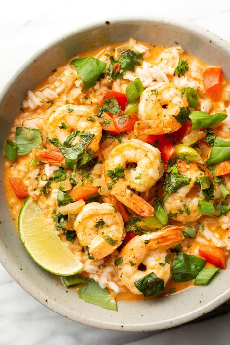 Busy weeknights are made for this Thai shrimp curry recipe! It's simple to make, and there's plenty of the rich coconut red curry sauce with fresh herbs to serve over rice. Easy Coconut Curry Sauce, Red Curry With Shrimp, Thai Seafood Curry, Shrimps With Rice, Shrimp Coconut Rice, Red Curry Shrimp Thai Coconut Milk, Thai Coconut Shrimp Curry, Shrimp Curry Recipe Thai, Shrimp And Fish Recipes