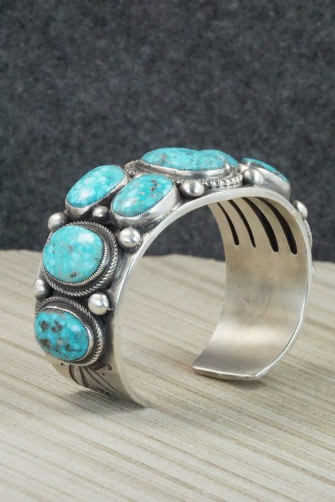 This Kingman turquoise and sterling silver bracelet was made by Navajo silversmith Calvin Martinez. The inside is signed C MTZ, Navajo and stamped sterling.Size: 5 3/8" (will fit up to a 6 1/2" wrist)Gap: 1 1/8"Length: 1 1/8"Free shipping on all orders! We ship with USPS and always include tracking. All orders ship within a day of payment.Returns are accepted up to 30 days after you receive your order. Just send us a message. Our shop offers cash back or store credit. The item must be returned i Turquoise Bracelets, Cowboy Gear, Navajo Bracelet, Diy Jewelry Inspiration, Turquoise Jewelry Native American, American Indian Jewelry, Navajo Jewelry, Native Jewelry, Southwestern Jewelry