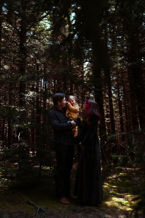 Tattoos, pine trees, black velvet dress, green moss, how could this get any cooler? Moody, dark, family and maternity portaits are now my favorite thing. In Asheville, North Carolina. #moody #dark #forest #photography #portraits #maternity #witchy #skull #skulls #bones #unique #different Dark Family Photos, Moody Christmas Photoshoot, Gothic Family Photoshoot, Dark Family Photoshoot, Dark Forest Photography, Moody Family Photos, Maternity Family Photoshoot, Velvet Dress Green, Dark Fae