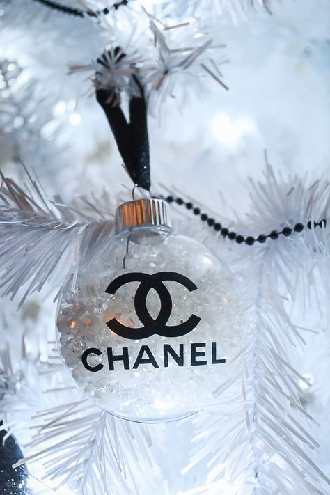 Create this beautiful Chanel inspired ornaments with minimal materials. Host a craft party and create these with friends, or give as a gift! Either way these are fun and easy to make! Chanel Room, Glitter Ornaments Diy, Chanel Decor, Glamorous Christmas, Glam Christmas Decor, Luxury Christmas Tree, Dreaming Of A White Christmas, Glam Christmas, Xmas Wallpaper