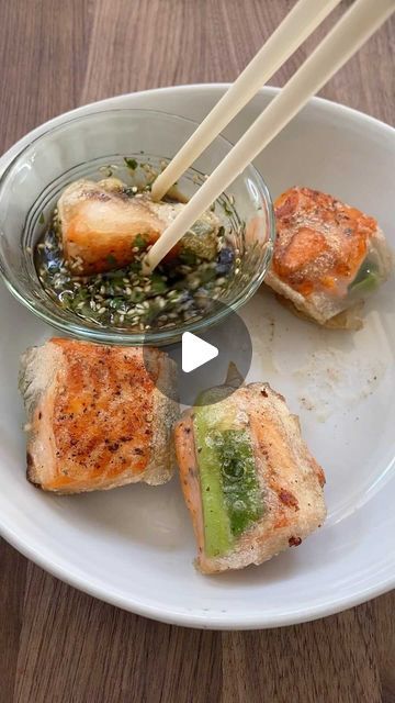 My Nguyen on Instagram: "Save and Share my recipe for Fire Cracker Salmon! It’s so easy to make! Simply fry some salmon, wrap in rice paper and green onions and fry again until crispy. The sauce is 1 tbsp soy sauce, 1 tbsp sesame oil, 1 tsp white vinegar, 1 tsp brown sugar and toss in some sesame seeds and cilantro. #firecrackersalmon #salmonrecipe #salmonroll #ricepaper #asianrecipes #asianfood #appetizerideas #healthyrecipes #easyrecipes #cookingvideos" Rice Paper Recipes Salmon, Fire Cracker Salmon, Firecracker Salmon, Rice Paper Recipes, Rice Paper Wraps, Salmon Wrap, Fire Cracker, Salmon Roll, Fried Salmon