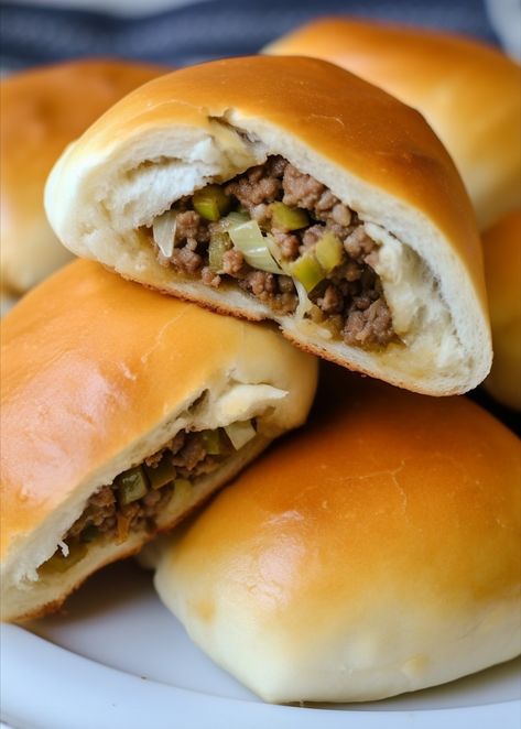 How to make Simple Nebraska Runzas Recipe Ingredients 16 Rhodes rolls (frozen unbaked roll dough) 1 lb lean ground beef 2 tablespoons butter 1 small yellow onion, finely chopped 2 cups finely chopped cabbage Salt and pepper to taste 1-2 tablespoons all-purpose flour 1 egg 1 tablespoon milk Instructions: Place frozen rolls on parchment-lined baking […] God Bless America Cake, Runzas Recipe, Runza Casserole, Bierocks Recipe, Rhodes Rolls, America Cake, Frozen Rolls, Frozen Bread Dough, Homemade Dough