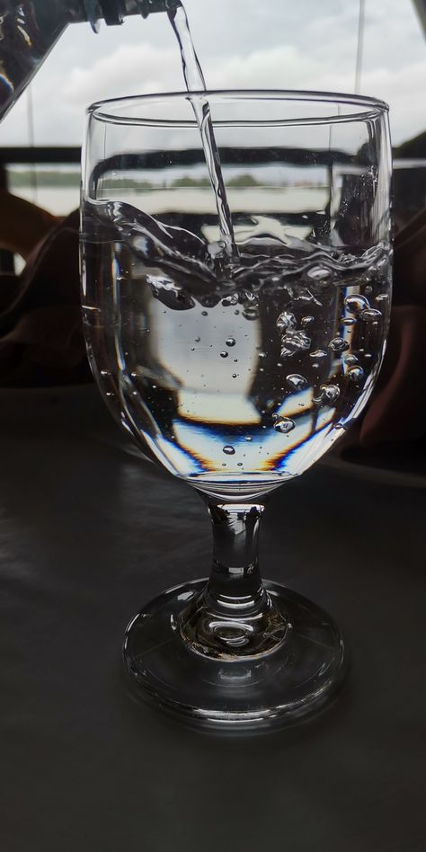 Pouring Water in glass cup Pouring Water Reference, Water In Wine Glass Aesthetic, Cup Pouring Water Drawing, Water In A Cup, Water In Glass, Object References, Reflection Pictures, Water Photos, Pouring Water