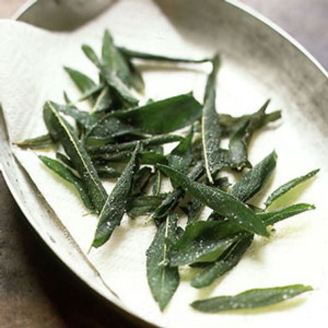 Delicate, crunchy fried sage can be crushed and sprinkled on squash or bean soups, served as an accompaniment to burgers, and even eaten whole as a snack. Fried Sage Leaves Recipe, Garlicky Kale, Fried Sage, Sage Recipes, Winter Veggies, Sage Leaves, Garden Recipes, Bean Soup, Fresh Herbs