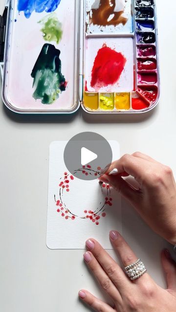 Anna Koliadych on Instagram: "Easy and fun way to paint a Christmas berry wreath with watercolor and a Q-tip technique ❤️✨🎄 #watercolor #watercolortutorial #crafts #diy #watercolorpainting #watercolorillustration #inspiration #artinspiration #christmasdiy #christmascard" How To Draw A Christmas Wreath Easy, Painting Christmas Wreath, Christmas Wreaths Painting, Winter Painting Ideas For Kids, Diy Watercolor Christmas Cards Tutorials, Watercolor Wreath Christmas, Happy New Year Art Ideas, Watercolor Christmas Cards Diy Ideas, Watercolor Art Ideas Easy Simple