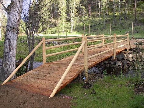 CAUTION Before Building Bridge's on a Small Stream on Your Property Creek Bridges Ideas, Rustic Bridge Over Creek, Diy Bridge Over Creek How To Build, Creek Bank Landscaping, Diy Creek Bridge, Diy Bridge Over Creek, Small Bridge Design, Diy Bridge, Yard Bridge