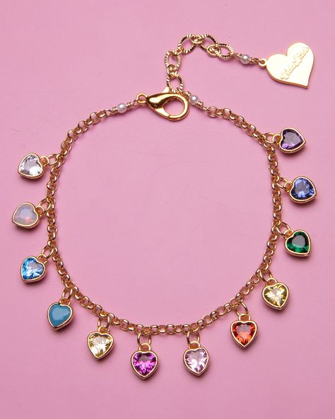 This Rainbow Heart Bracelet will put a smile on anyone's face! With its bright and colorful design, it's sure to take your heart on a joy ride—and with no curbs! A perfect way to brighten any day. Materials: 18K Gold Plating, Cubic Zirconia, Stainless Steel. Hypo-allergenic.Length: 6" Bracelet with 1" extension chain (Sizes Available)Pendant Dimensions: 6mm Care: Our jewelry is designed to be water-resistant, so you don't have to worry about taking it off when you're near water. However, we reco Cute Girly Accessories, Girlie Gifts, Take Your Heart, Pink Gold Jewelry, Joy Ride, Circle Bracelet, Fairy Necklace, Rainbow Jewelry, Rainbow Bracelet