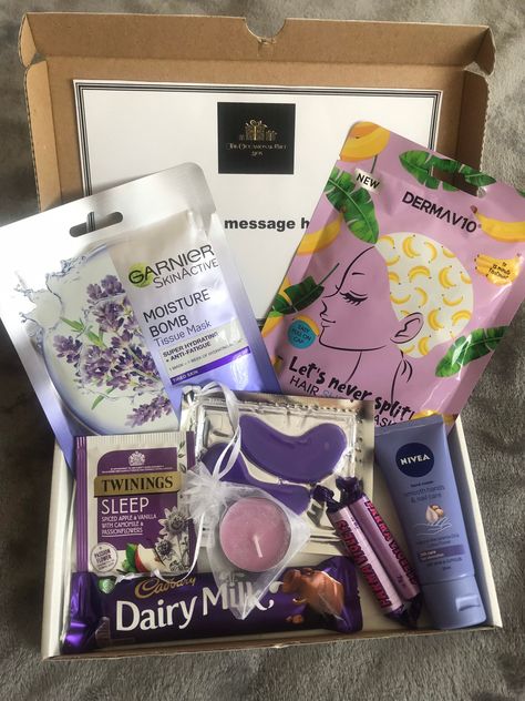 Treat yourself or someone special to one of our pamper gift boxes. Perfect for any occasion whether that be for a birthday, distance care package, mothers day, pick me up or even just because... This is an A5 sized box.  Content: - Garnier Face Mask - Hair Sheet Mask - Nivea Hand Cream  - Under Eye Gel Mask - X2 Parma Violets - Twinnings Tea bag - candle - Chocolate  * Product types may change due to stock availability however will be equally as good.  If you would like to send a message to the Twinnings Tea, Chocolate Product, Birthday Hug, Parma Violets, Mask Hair, Hair Care Gifts, Diy Gift Set, Gift Boxes For Women, Gifts For Girlfriend