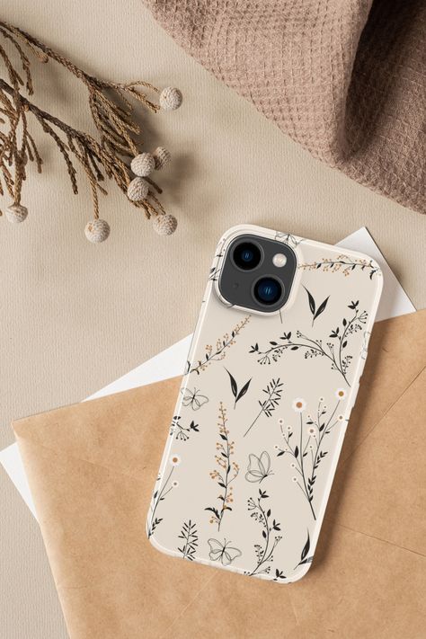 Phone case available for multiple iPhone models, in snap, soft and though cases. Iphone models available: 4s, 5s, 5c, 6, 6s, 7, 8, XR, X, XS, 11, 12, 13, 14. Aesthetic phone case, with a one line art flower pattern in neutral color. Beautiful vintage flower pattern that fits a boho aesthetic. Boho line art design in beige and burnt orange. Cute wild flowers pattern design. Iphone 13 Cases Aesthetic, Aesthetic Phone Case Ideas, Beige Phone Case, March Aesthetic, Flowers Pattern Design, Boho Phone Case, Boho Line Art, Chic Phone Case, Vintage Flower Pattern