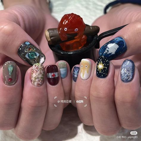 Nails inspired by howl's moving castle Ghibli Inspired Nails, Studio Ghibli Inspired Nails, Howls Moving Castle Nail Art, Ghibli Nail Art, Totoro Nails, Howls Moving Castle Nails, Studio Ghibli Nail Art, Ghibli Nails, Studio Ghibli Nails