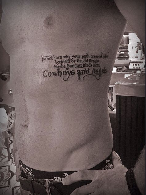 Cowboys and Angels. Bleeding Cowboy font tattoo. Rib Tattoos For Guys Quotes, Country Style Tattoos For Men, Men’s Western Tattoos, Western Rib Tattoos, Western Tattoos Men, Western Tattoos For Men, Country Tattoos For Guys, Country Tattoos For Men, Cowboy Sleeve Tattoo