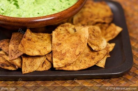 Make your own home-made tortilla chips for much better flavor and a whole lot less salt.  These tortilla chips are flavored with lime and chili powder perfect for a salsa or Chile con queso dip. Con Queso Dip, Lime Tortilla Chips, Baked Tortilla Chips, Lime Cake, Queso Dip, Chili Lime, Vegan Appetizers, Salty Snacks, Homemade Snacks