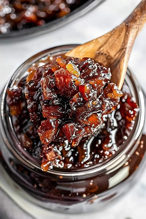 Bourbon bacon jam is a heavenly blend of smoky, sweet, and savory flavors. It's a labor of love, but it's guaranteed to make your taste buds sing. Bourbon Bacon Jam Burgers, Bourbon Bacon Jam Crostini, Bacon Jam For Canning, Sweet And Spicy Bacon Jam, Whisky Bacon Jam, Candied Bacon Jam, Bacon Salt Recipe, Apple Bacon Jam, Savory Jelly Recipe