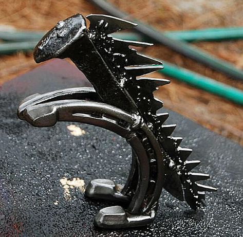 Rail Spike Godzilla by J. Young Railroad Spikes Crafts, Railroad Spike Art, Metal Sculpture Artists, Cool Welding Projects, Railroad Spikes, Welding Art Projects, Diy Welding, Horseshoe Art, Solar Projects