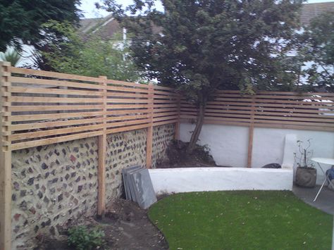 extend height of a fence | Recent Photos The Commons Getty Collection Galleries World Map App ... Fence Extension, Privacy Fence Landscaping, Fence Toppers, Privacy Fence Designs, Backyard Fence, Brick Fence, Garden Privacy, Backyard Privacy, Privacy Fences