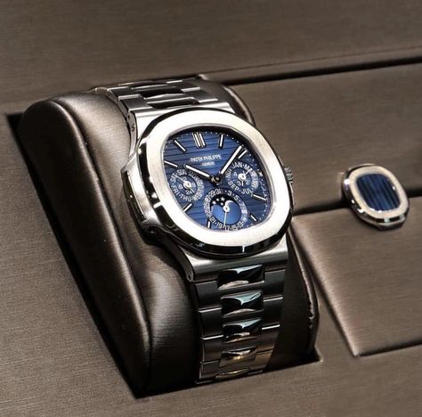 Patek Philippe Nautilus 5740G $105,000 Patek Watches, Stylish Watches Men, Patek Philippe Watches, Swiss Army Watches, Old Watches, Hand Watch, Luxury Timepieces, Patek Philippe Nautilus, Stylish Watches