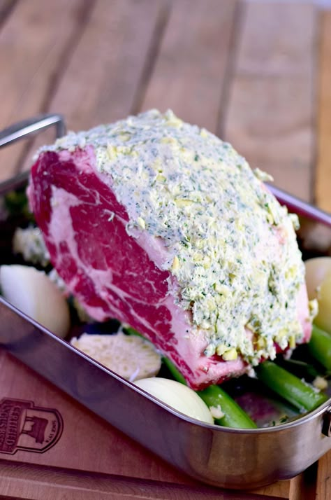 There's nothing quite like a succulent rib roast from my neighborhood QFC Grocery. Coated in a mouthwatering herb garlic butter and finished with a rich red wine gravy, this dish is a showstopper. Thanks to the Roast Perfect App by Certified Angus Beef, I was guided flawlessly through the roasting process. Impress your guests with this masterpiece and watch them savor every bite. #roastperfect #bestangusbeef #steakholder #beef #ribroast #keto | bobbiskozykitchen.com Rib Of Beef Roast, Ribeye Roast Recipes Bone In, Perfect Prime Rib Everytime, Bone In Prime Rib Roast Oven, Rib Roast Recipe Bone In Oven, Small Prime Rib Roast Recipe, Boneless Prime Rib Roast Oven, Best Prime Rib Recipe Ever, Ribeye Roast Recipes