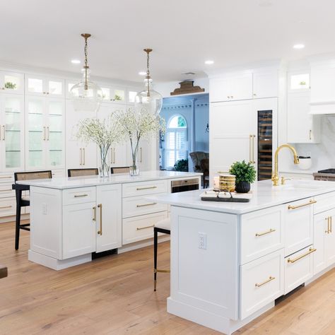 Double islands in a classy white kitchen? Yes, please! Contact us today to design your perfect entertaining kitchen. Showplace Pendleton door | White paint . . . #cabinets #entertaining #entertainingkitchen #kitchen #kitchenremodel #showplacecabinetry #whitekitchen 70” Kitchen Island, Two Kitchen Islands Layoutwhat Sixe Fir Kitchen Iskand, Double Kitchen Islands, White Cabinets Dorion Walls Gaunlet Island, White Perimeter Cabinets Wood Island, Kitchen Dual Tone Cabinets 36", Double Islands, Entertaining Kitchen, Kitchen Cabinet Remodel