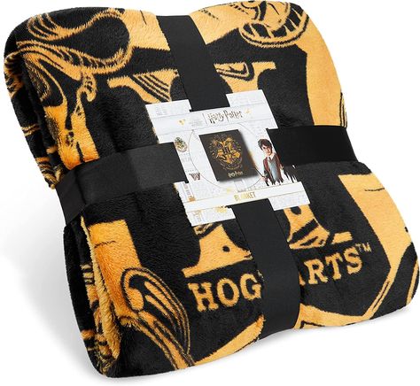 Super-soft Harry Potter fleece throw - snuggle up into a world of magic with this throw blanket for kids, teens and adults featuring a striking black and gold Hogwarts house crest design Black And Gold Logo Design, Harry Potter Blanket, Hogwarts Houses Crests, Gold Logo Design, Cosy Blanket, Crest Design, Harry Potter Merchandise, Hogwarts Crest, Snuggle Blanket