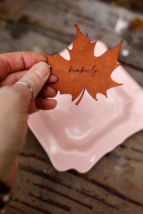 Leather Leaf Shaped Table Setting Card, Thanksgiving Place Card, Place Settings by LeftGrain on Etsy Leaf Place Cards, Cricut Thanksgiving Place Cards, Thanksgiving Name Place Cards, Thanksgiving Place Settings, Thanksgiving Name Cards, Simple Thanksgiving Table, Place Settings Thanksgiving, Holiday Dinner Table, Thanksgiving Place Cards