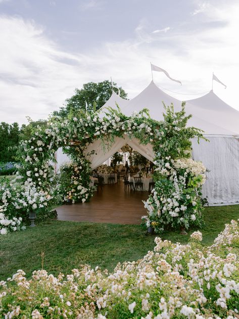 Tent entrance at Rhode Island wedding with white flowers Tent Entrance, Floral Archway, Oakleaf Hydrangea, Christian Mccaffrey, East Coast Wedding, Ceremony Dresses, Wedding Inside, Olivia Culpo, Wedding Tent