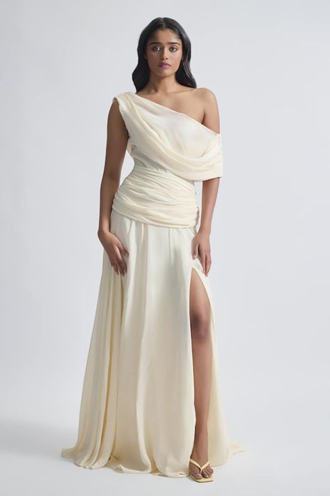 Buy Off White Crepe Solid Asymmetric Neck Gemma Draped Flowy Gown For Women by Deme by Gabriella Online at Aza Fashions. Off White Gown, Ethereal Gowns, Ethereal Gown, Dress To Jumpsuit, Bohemian Gown, Flowy Gown, Greece Fashion, Boho Wedding Gowns, Outfit References