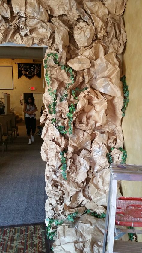 From a Caveman to a King Caveman Party Decorations, Cave Theme Party, Caveman Decorations, Caveman Party Ideas, Caveman Party, Cave Decorations, Class Door Decorations, Indiana Jones Party, Paper Mache Tree