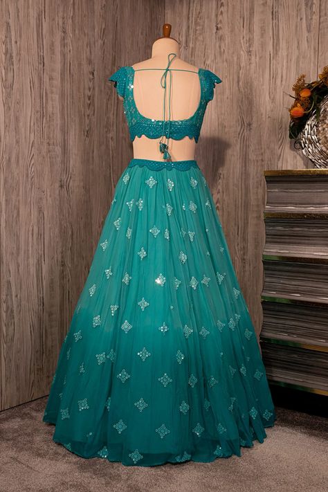 https://www.seasonsindia.com/product/peacock-bluish-green-lehenga-set-with-oablao-work-paired-with-a-matching-scalloped-dupatta-and-tikli-work-blouse/ Casual Blouse Designs, Silk Saree Blouse Designs Patterns, Simple Frock Design, Simple Lehenga, Long Frock Designs, Mehendi Outfits, Long Gown Design, Simple Frocks