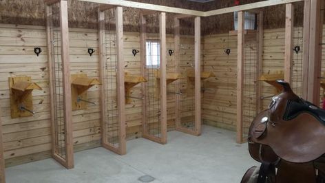 Saddle racks and tack room dividers my brother and I made. Tack Room Cubbies, Tack Room Ideas Barn, Horse Organization, Western Village, Tack Storage, Barn Organization, Tack Locker, Tack Room Organization, Feed Room