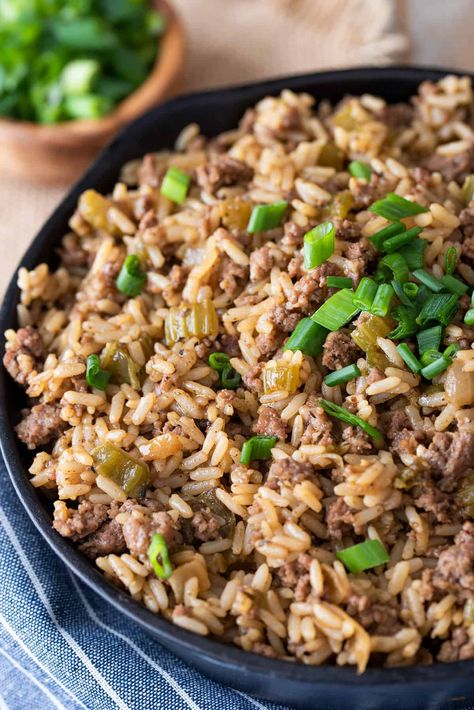 Indulge in the rich flavors of a Cajun classic recipe with this Old-Fashioned Dirty Rice. True Louisiana cuisine in one pot cooking. Serve as a side dish or with gumbo. Cajun Dressing Recipe, Louisiana Dirty Rice Recipe, Cajun Dressing, Louisiana Dirty Rice, Cajun Rice Dressing, Cajun Dirty Rice, Cajun Spices, Honey Teriyaki Chicken, Cajun Rice