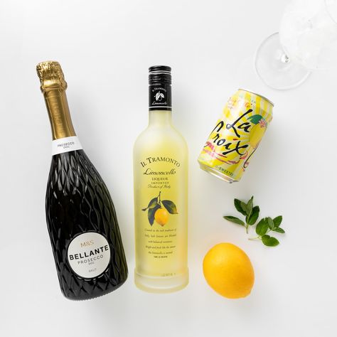 Lemon Spritzer Recipe (Limoncello Spritz Cocktail) Lemon Cello Prosecco Spritzer, Lemon Chello Sprits, Lemon Cello Spritzer, Limoncello Spritzer With Prosecco, Lemoncello Spritzers Recipe, Prosecco Limoncello, Lemoncello Recipes, Limoncello Glasses, Drink Gift Basket