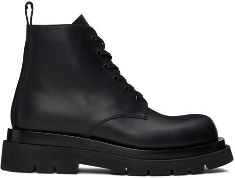 Ankle-high vegetable-tanned buffed calfskin boots in black. · Lace-up closure · Pull-loop at heel collar · Grained calfskin lining · Stacked leather platform midsole · Treaded rubber outsole · Platform: H1.5 in · Heel: H2.25 in Supplier color: Black Lug Boots, Bottega Veneta Shoes, Lug Sole Boots, Suede Lace, Sole Shoes, Mens Shoes Boots, Black Ankle Boots, Casual Boots, Work Boots