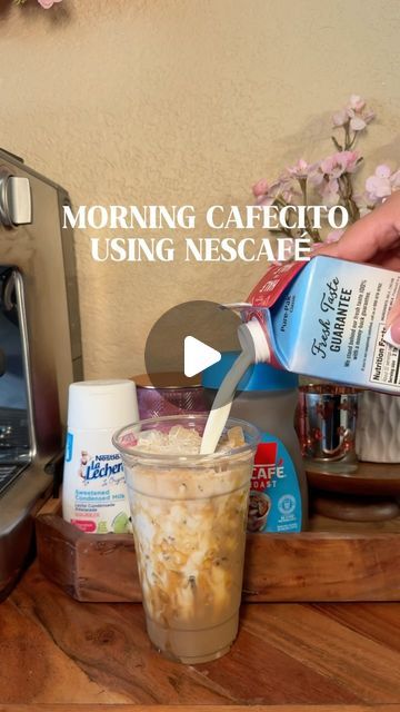 JENN JIMENEZ🌹✨ on Instagram: "My favorite time of the day. ☕️🤎 #icedcoffee #icedcoffeeathome #nescafe #nescafeiceroast #cafecito   What you need ☕️✨ 1. Nescafe ice roast 2. Condensed milk 3. Caramel sauce  4. Your favorite ice 5. Your favorite cup, I have mine linked on my Amazon storefront.  6. Electric whisk  7. Water   This might be controversial, but my iced coffee tastes better in my plastic to go cups. Am I the only one?😩🫠" Nescafé Protein Coffee, Ice Coffee Aesthetic Wallpaper, Ice Coffee With Instant Coffee, Nescafe Instant Iced Coffee Recipes, Nescafe Gold Iced Coffee Recipe, Nescafé Ice Roast Recipe, Nescafe Iced Coffee, Condensed Milk Iced Coffee, Nescafe Iced Coffee Recipe