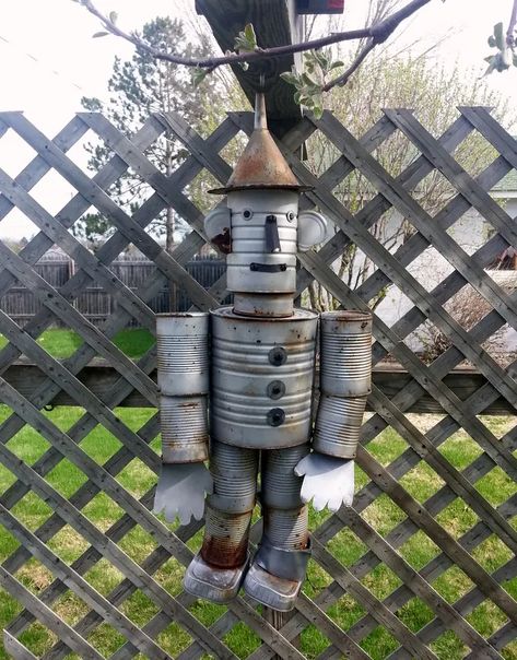 How To Make A Recycled Tin Man - HubPages Tin Can Man, Recycled Cans, Tin Can Art, Aluminum Can Crafts, Recycle Cans, Recycled Tin, Tin Can Crafts, Painted Wine Bottles, Tin Man