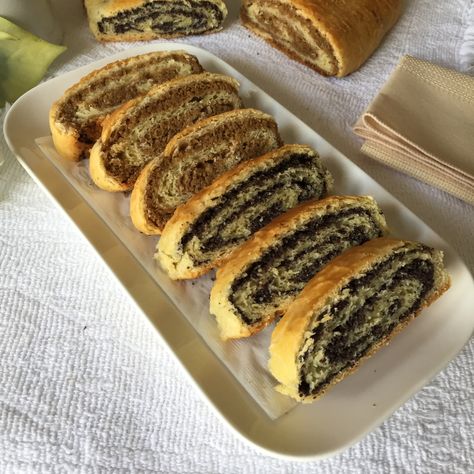 This traditional all-time favourite Hungarian pastry rolls has been in my family for generations. The dough is buttery soft and flaky with delicious walnut and poppy seed citrus fillings. A must for any holiday celebration.  This pastry brings back such… Poppy Seed Babka Recipe, Old Fashioned Nut Roll Recipe, Hungarian Nut Roll Recipe, Poppyseed Roll, Povitica Recipe, Poppy Seed Rolls, Hungarian Cookies, Nut Roll Recipe, Pastry Rolls