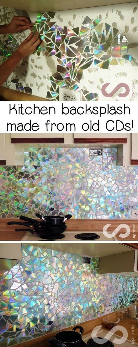 This backsplash idea was made from old CDs! What a great recycling project for the home! Upcycling at it's finest. A fun and gorgeous way to recycle old CDs. #recycling #upcycling #projects #homedecor#backsplash #cds #crafts #instrupix#kitchendecor Recycler Diy, Diy Recycled Projects, Diy Kitchen Backsplash, Old Cds, Astuces Diy, Ways To Recycle, Upcycled Home Decor, Recycled Projects, Diy Recycle