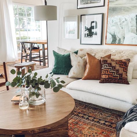 neutral mid century modern living room with beige sofa and a gallery wall #livingroomdecor #livingroom #homedecor #neutraldecor #midcenturymodern #gallerywall Bohemian Bungalow, Beige Couch, Apartment Decoration, Hobbit Hole, Homeward Bound, Decorative Ideas, Beautiful Rooms, Modern Organic, Gallery Walls