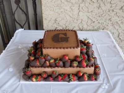 Two tier chocolate grooms cake with strawberries. By dacakeldy on CakeCentral.com Chocolate Grooms Cake With Strawberries, Square Grooms Cake, Grooms Cakes Ideas, Strawberry Grooms Cake, Grooms Cake Ideas, Chocolate Grooms Cake, Grooms Cake Tables, Groomsman Cake, Groom Cakes