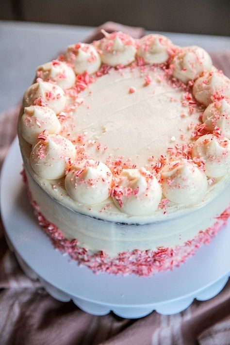 The ultimate Christmas Cake! This Chocolate Candy Cane Cake is a soft and sweet chocolate cake frosted with a creamy peppermint frosting and topped with crushed candy canes. It’s the perfect show-stopping dessert for the holidays. Candy Cane Cake Recipe, Candy Cane Cake, Peppermint Frosting, Chocolate Cake Frosting, Sweet Chocolate Cake, Homemade Eggnog, Cutout Sugar Cookies, Ultimate Christmas, Vanilla Buttercream