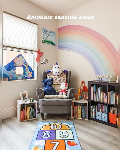 Easy Decor | Reading Rainbow Nook | We removed our cardboard playhouse and replaced it with a magical rainbow reading corner Rainbow Reading Corner, Reading Corner Bedroom, Corner Bedroom, Wood Plank Tile, Books By Color, Rainbow Wall Decal, Condo Interior Design, Budget Remodel, Small Condo