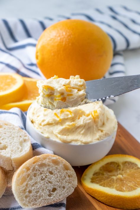 This Orange Butter recipe is a sweet and tangy citrus-infused compound butter made with only two ingredients - butter and orange juice! It's delicious and versatile - spread it over baked goods like muffins and scones, or use it in savory dishes as a glaze or sauce! Orange Compound Butter, Savory Citrus Recipes, Butter Themed Party, Sweet Compound Butter Recipes, Orange Curd Desserts, Infused Butter Recipe, Orange Butter Recipe, Breaky Ideas, Sweet Spreads