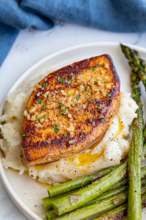 This Garlic Butter Tofu is officially my new FAVORITE tofu recipe! It's such a great meal to make for guests and it's surprisingly easy to throw together! Once you marinate it, you only need a handful of simple ingredients to finish it off! Butter Tofu, Tofu Marinade, Slow Cooker Pasta, Tofu Recipe, Tofu Dishes, Quick Weeknight Meals, Asparagus Recipe, Tofu Recipes, Sweet Potato Recipes