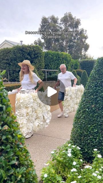 Giant Flowers Australia - Event Styling on Instagram: "This wedding had a bridal party of 20 people! The bride and groom with their many friends wanted to sit all together at the main table…so we have decorated it with our 7 meter giant flower bridal table decor. And the glamorous wedding cake by @cheskabakes_ matched the decor perfectly! 🌹🌹🌹🌹 . . #giantflowersperth #giantflowers #viralvideos #viralreels #florist #flowers #weddingideas #weddinginspiration #perthflowers #perthweddingarch #perthweddings #romanticwedding #diy #crafts #decor #weddingdress #bride #bridaltable #weddingcake" Diy Flower Table, Wedding Main Table Decor, Bride Groom Table Decoration, Wedding Decor Red Roses, Bridal Table Decor, Glamorous Wedding Cakes, Main Table Wedding, Wedding Australia, Candelabra Wedding Centerpieces