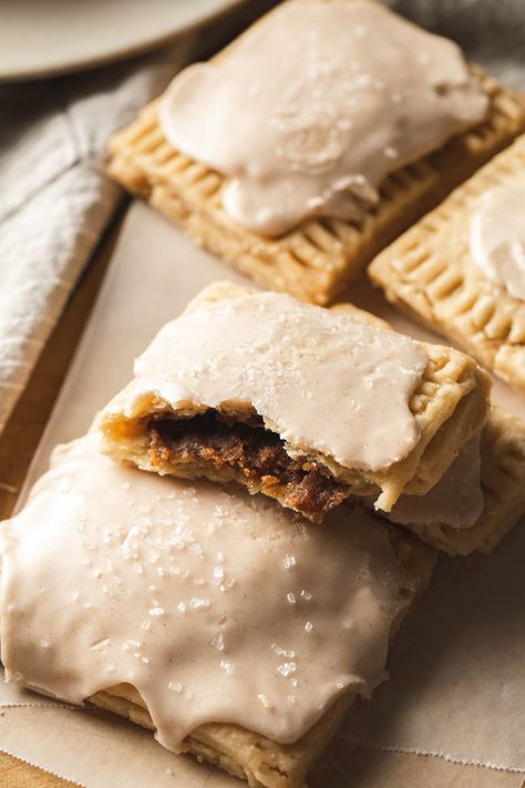 The Best gluten free vegan brown sugar pop tarts are flaky, brown sugar cinnamon filled pockets. Just in time for Fall. #vegan #vegandessert #veganrecipe #glutenfree #glutenfreevegan Gluten Free Pop Tarts, Brown Sugar Pop Tarts, Cinnamon Filling, Sugar Pop, Pop Tart, Gf Desserts, Gluten Free Sweets, Gluten Free Treats, Gluten Free Snacks