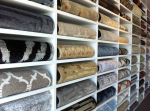 The custom rug display is filling up! Carpet Store Design, Rug Display, Carpet Display, Fabric Shop Display, Carpet Store, Ikea Rug, Showroom Decor, Showroom Ideas, Carpet Stores