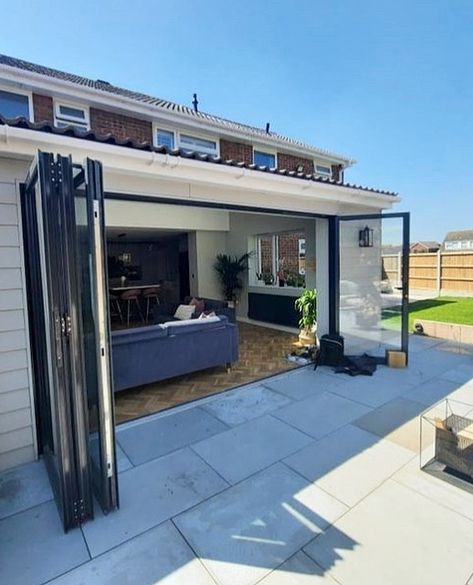 These stunning bifold doors open on both sides, creating a seamless connection between indoor and outdoor spaces. The flush threshold design ensures a smooth and uninterrupted flow, making your patio the perfect extension of your home. The doors are designed with large glass panels that let in an abundance of natural light, creating a bright living area. With years of experience in the construction and glazing industry, we make sure you have the perfect doors and installation.⁠ Roof Lantern, Aluminium Windows, Casement Windows, Folding Doors, Roof Light, Glass Boxes, Summer Breeze, Bifold Doors, French Doors