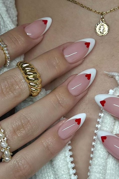 Romantic and Elegant: Stiletto Nails with White French and Red Heart Accents for Valentine's Day. // Photo Credit: Instagram @nailzkatkat Nail Art Cute, Paznokcie Hello Kitty, Kutek Disney, Unghie Nail Art, Nagel Tips, Cute Acrylic Nail Designs, Makijaż Smokey Eye, Heart Nails, Funky Nails