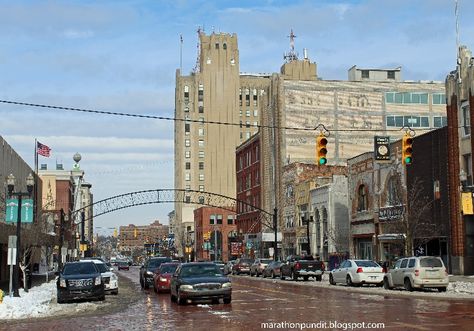 Saginaw Avenue in Flint, Michigan in winter Flint Michigan Vintage, Michigan Dogman, Miss Michigan, Flint Water Crisis, Flint Michigan, Banks Building, Ghost Signs, Lake Huron, Traveling Tips